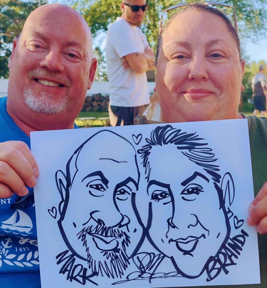 Guests at an outdoor party with their caricature